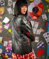 spark and rebel features upcycled leather jacket in eco fashion evil eye