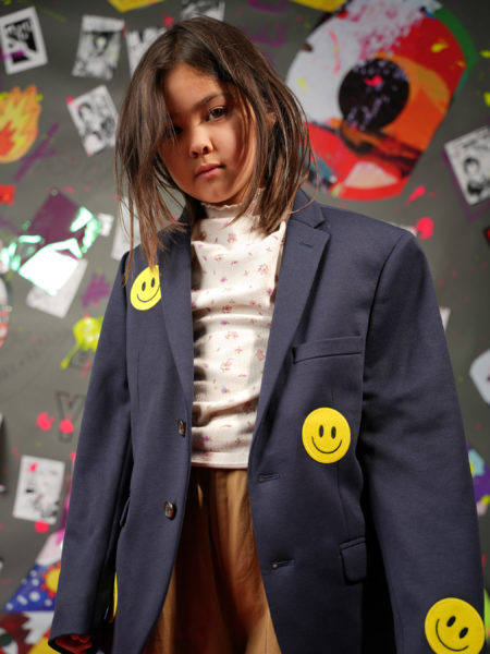 spark and rebel features upcycled ralph lauren school jacket in eco fashion