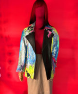 sparkpick features spark and rebel handmade upcycled neon paint leather jacket in sustainable fashion