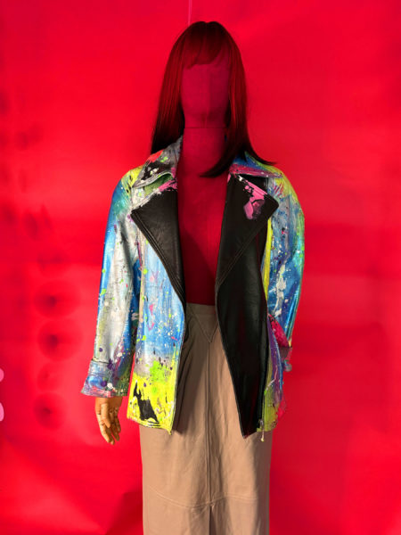sparkpick features spark and rebel handmade upcycled neon paint leather jacket in sustainable fashion