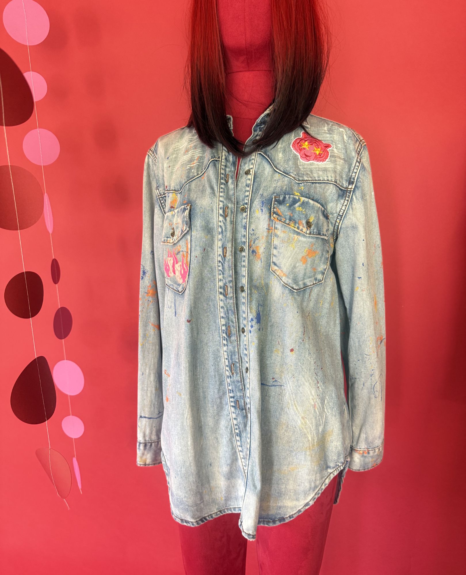 spark and rebel features painted denim jacket in eco fashion