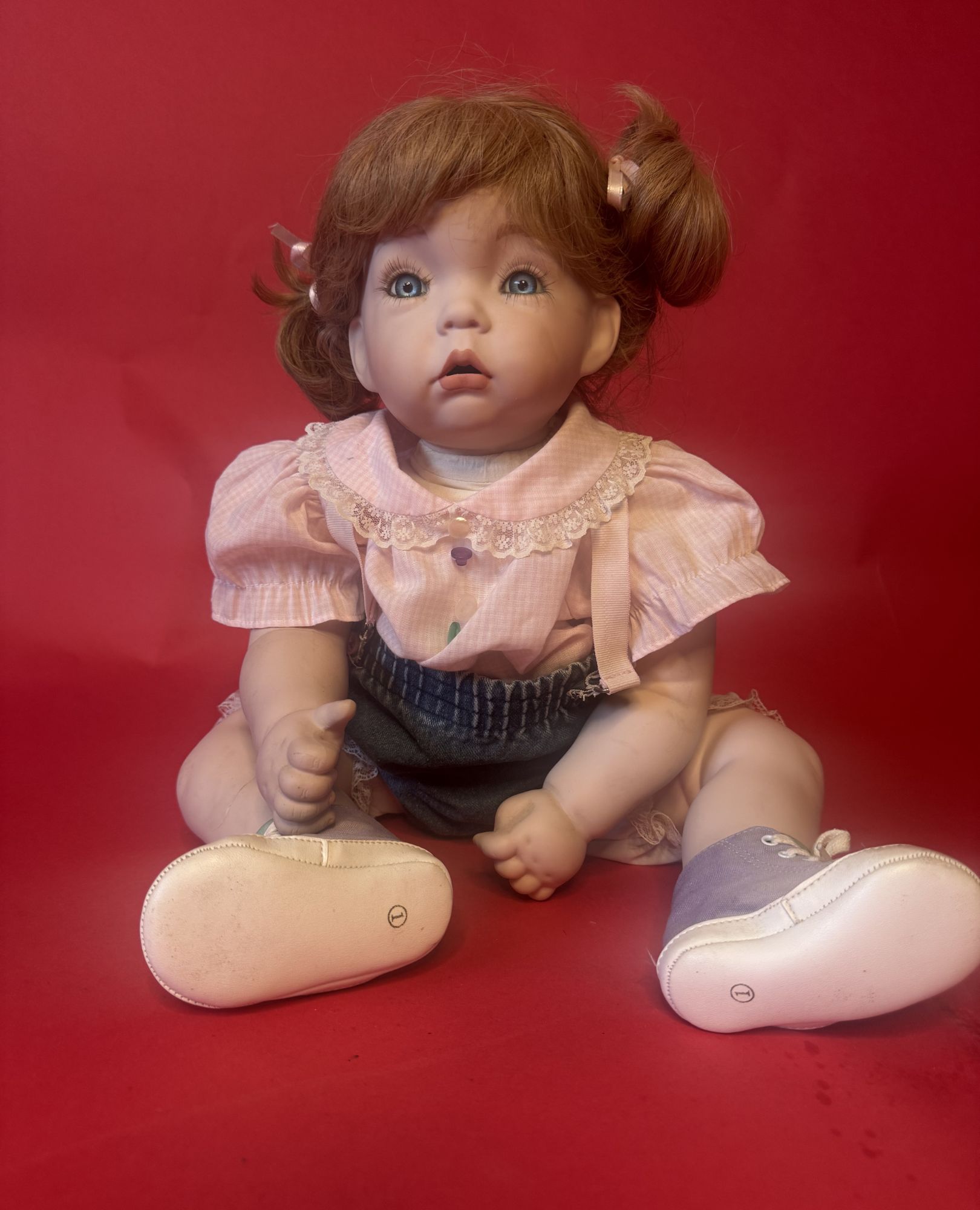 spark and rebel features porcelain-style baby doll in eco fashion