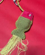 spark+rebel modular eco fashion brand handmade crochet fish airpod case in sustainable fashion on etsy